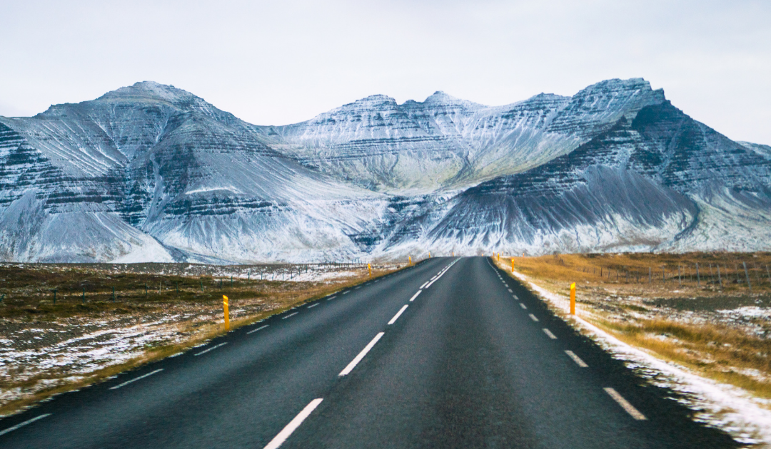 Icelandic mountains, snow and roadways