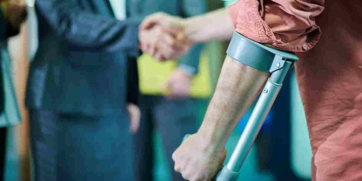 Man with a crutch meets with and shakes hands with his personal injury attorney
