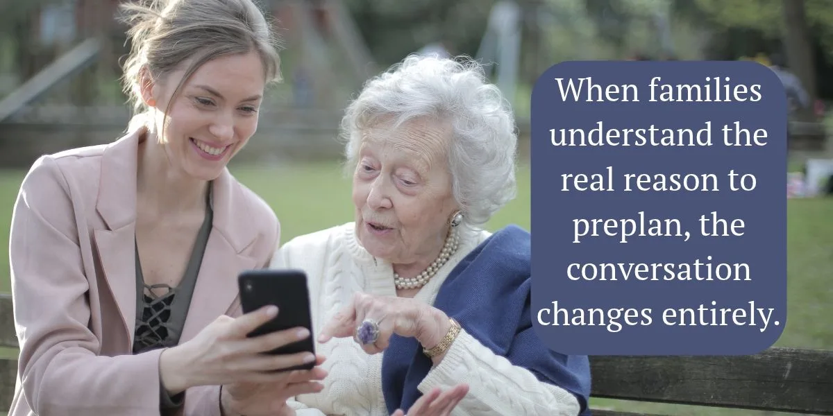 Adult woman helping her grandmother understand technology